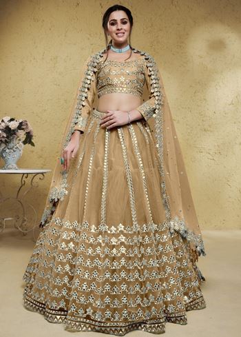 Stunning Beige Foil Work Net Wedding Lehenga Choli With Dupatta