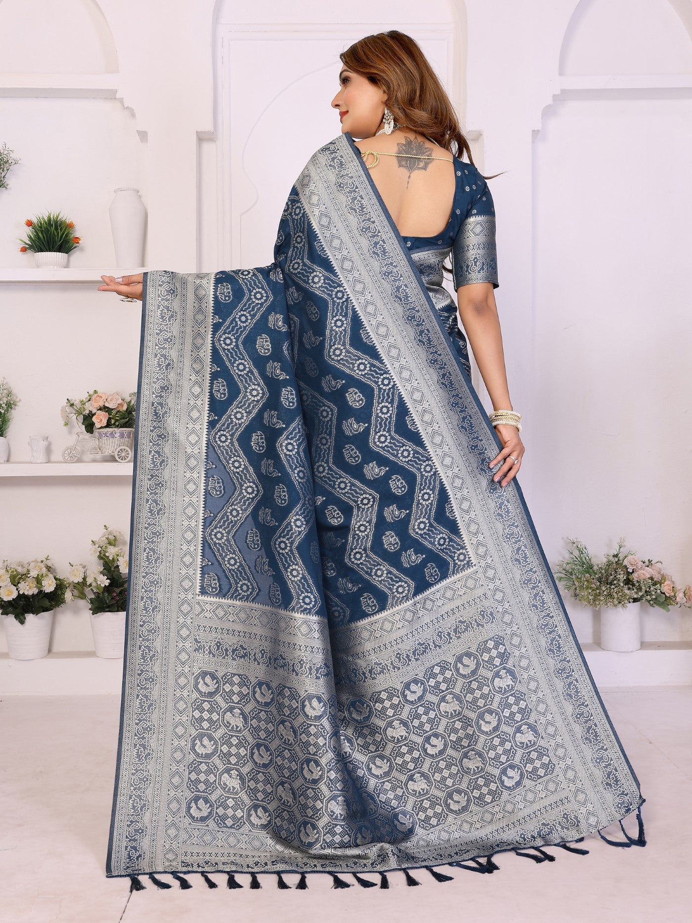 Teal Blue Georgette Silk Saree With Leheriya And Elegant Zari Weaving