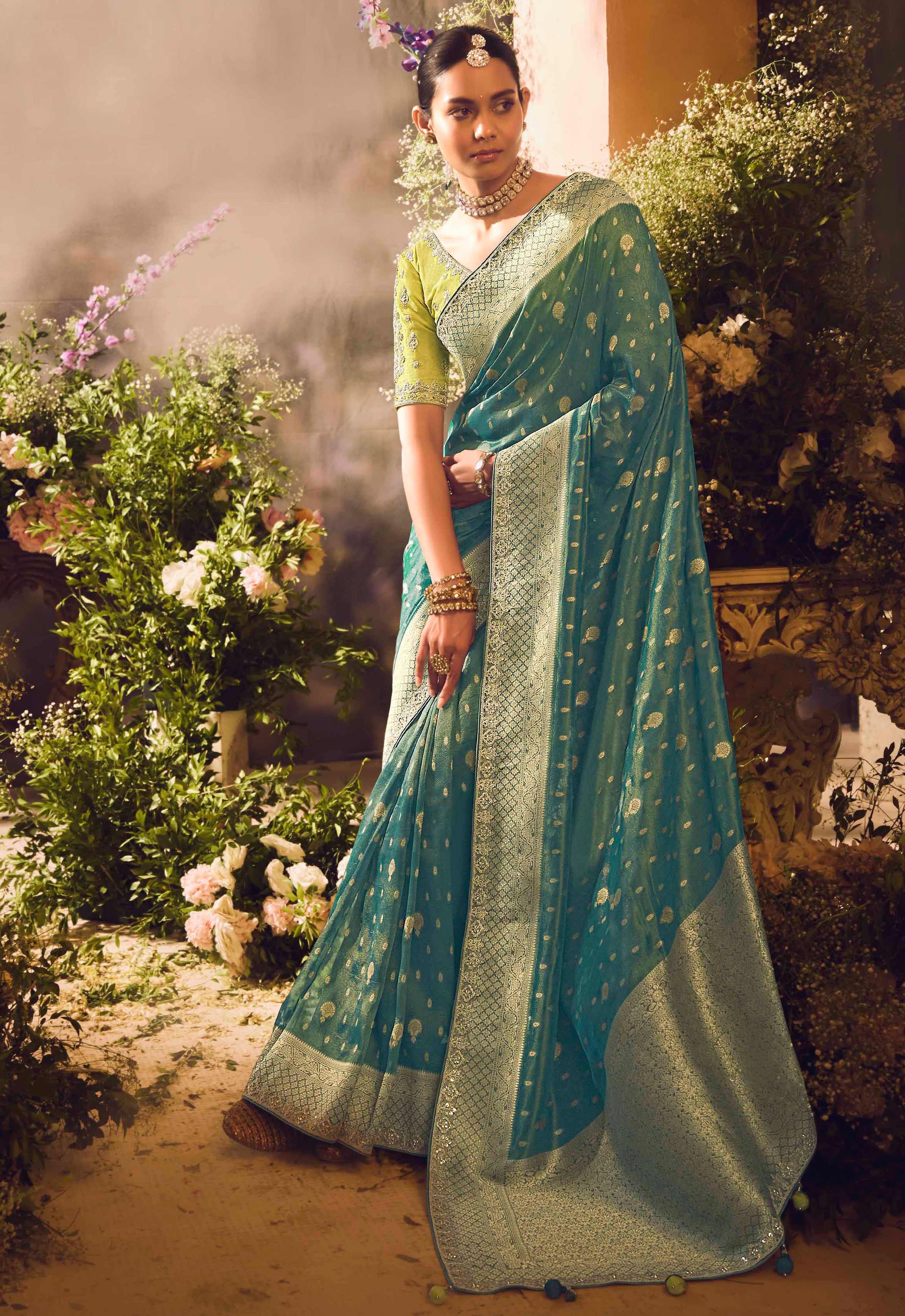 Teal Green Saree With  Jacquard Woven Work with Embroidered Lace Border