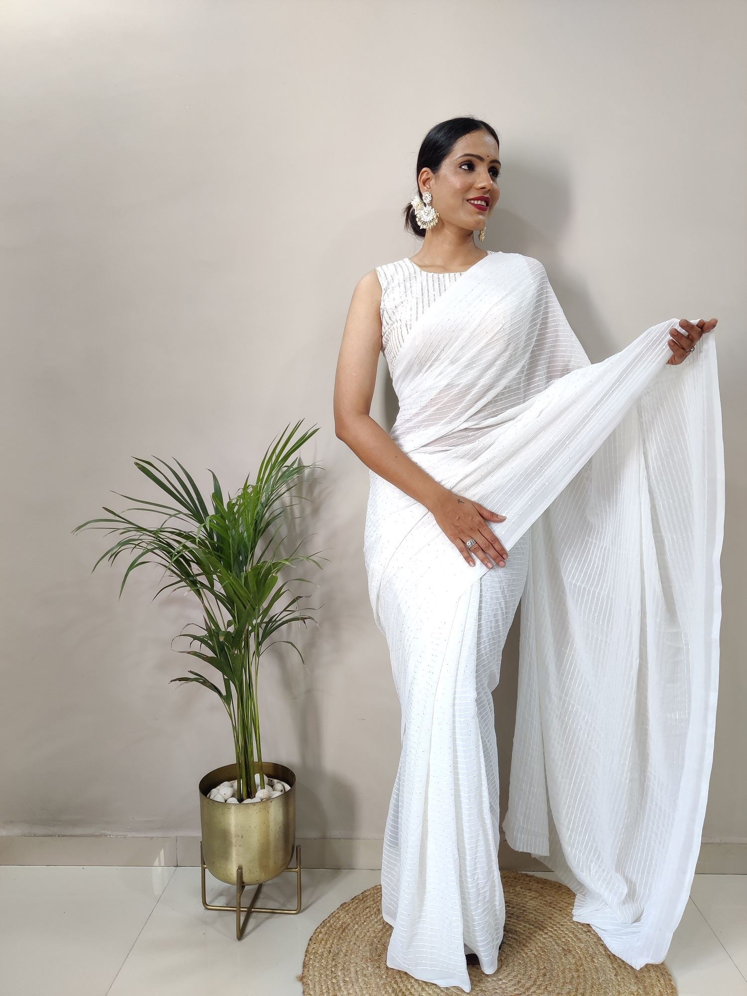 White Colour Georgette Fabric Heavy Work Saree