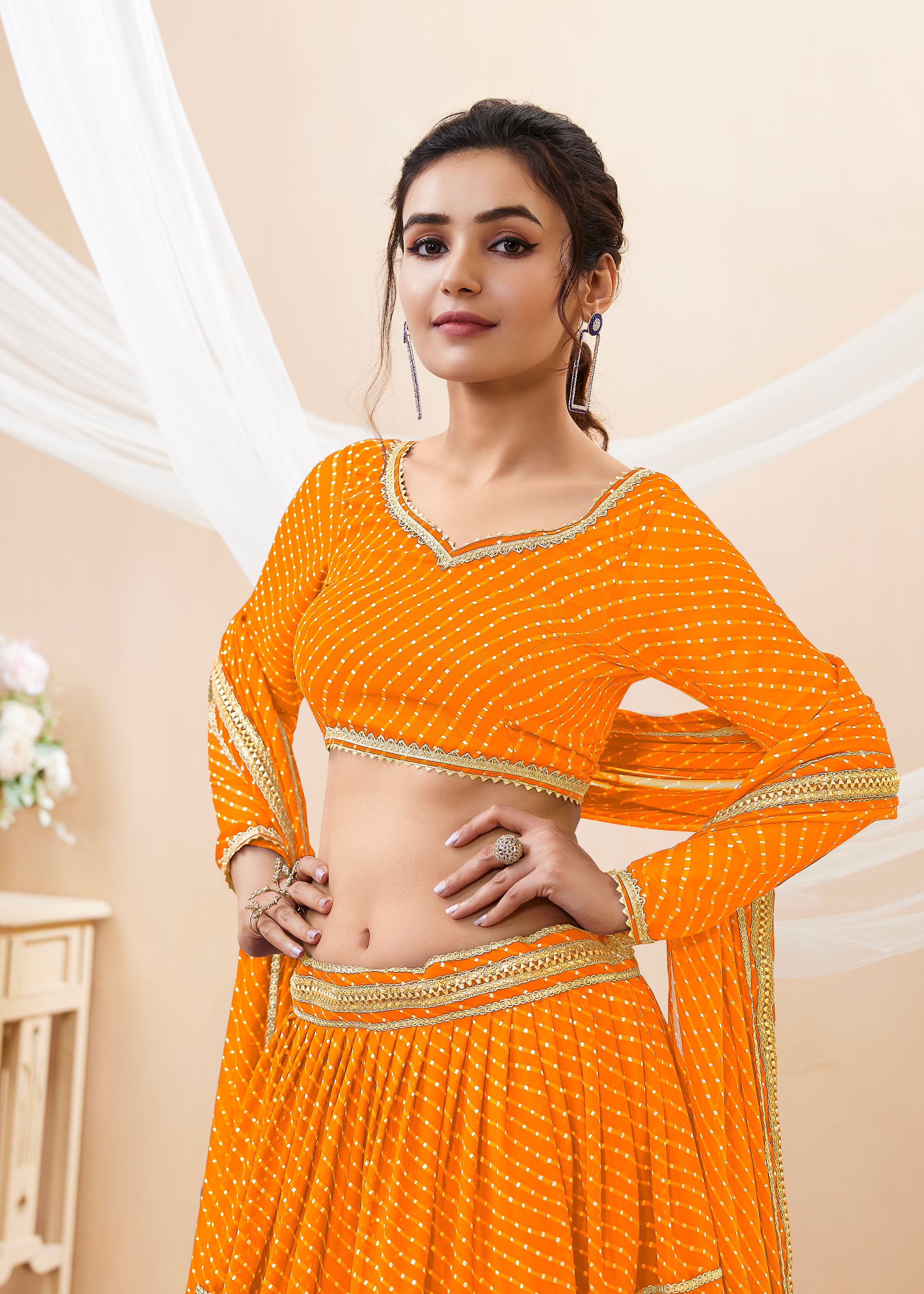Yellow Georgette Lehenga Choli With Georgette Leheriya Printed with lace all over work