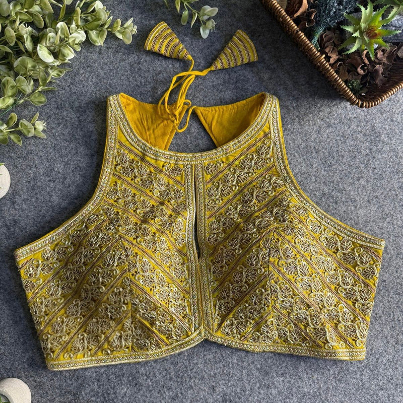 Yellow Halter Neck Partywear Blouse in Roman Silk with Embroidery & Sequins Work