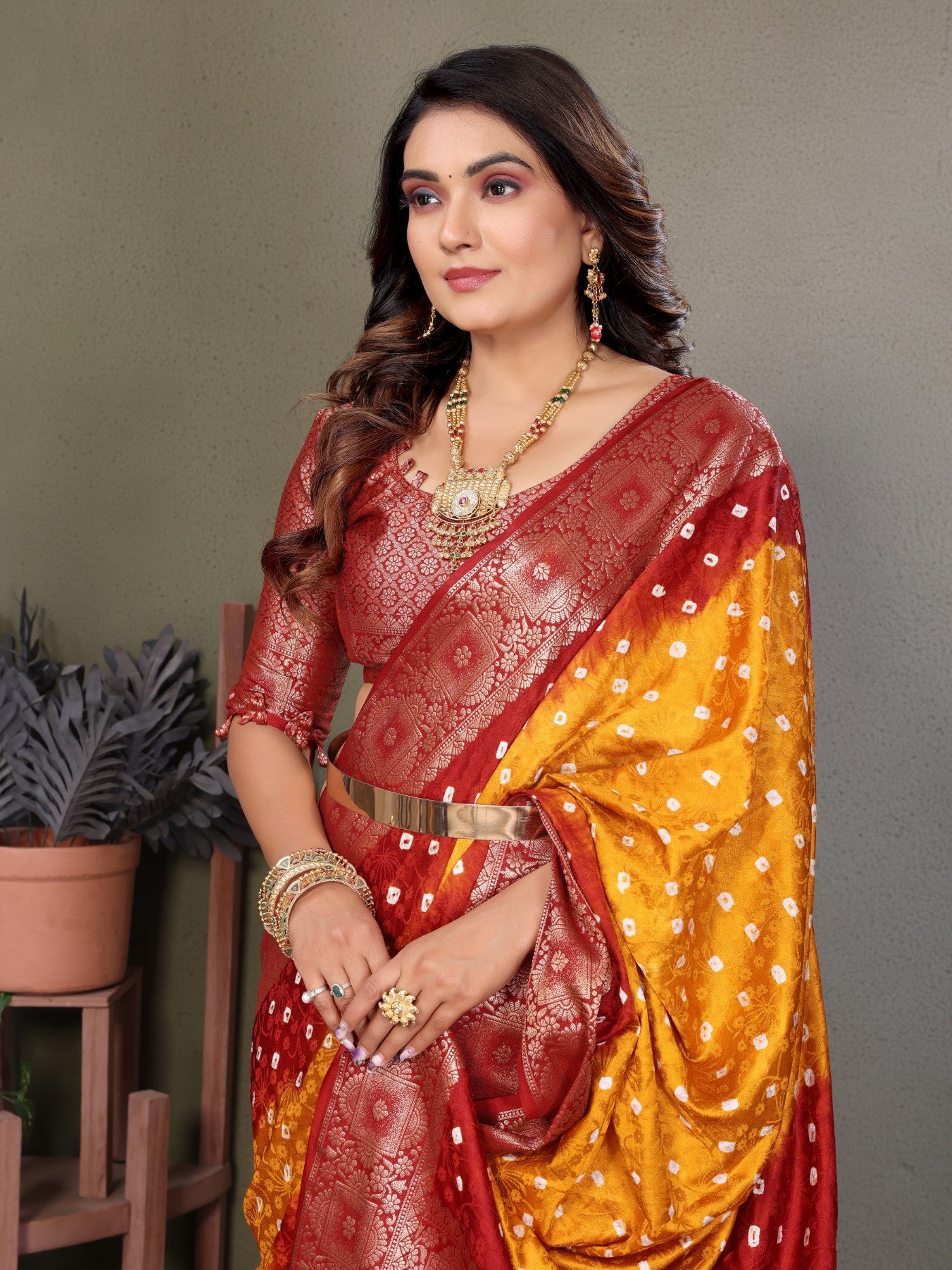 Yellow Satin Silk Saree With Bandhej And Zari Weaving